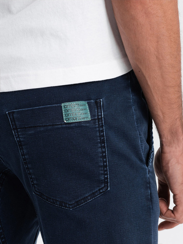 Ombre Clothing Tmavomodré pánske nohavice Ombre Oblečenie