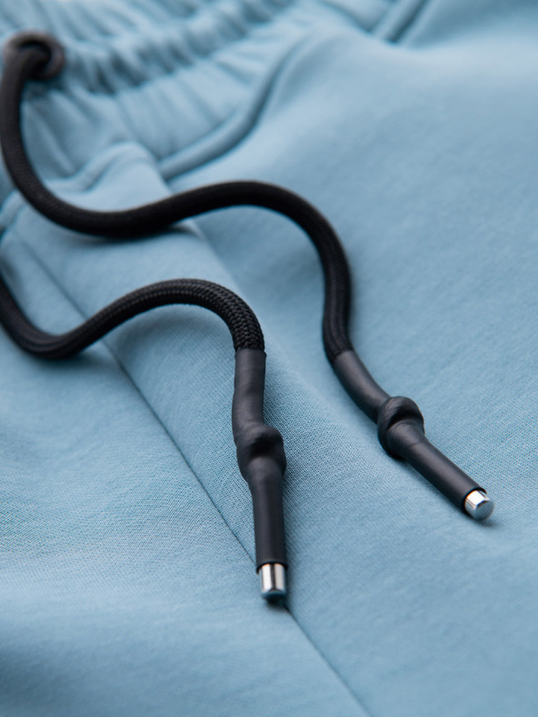 Ombre Clothing Pánske tepláky so žebrovanými manžetami a ozdobným zipsom Ombre Clothing