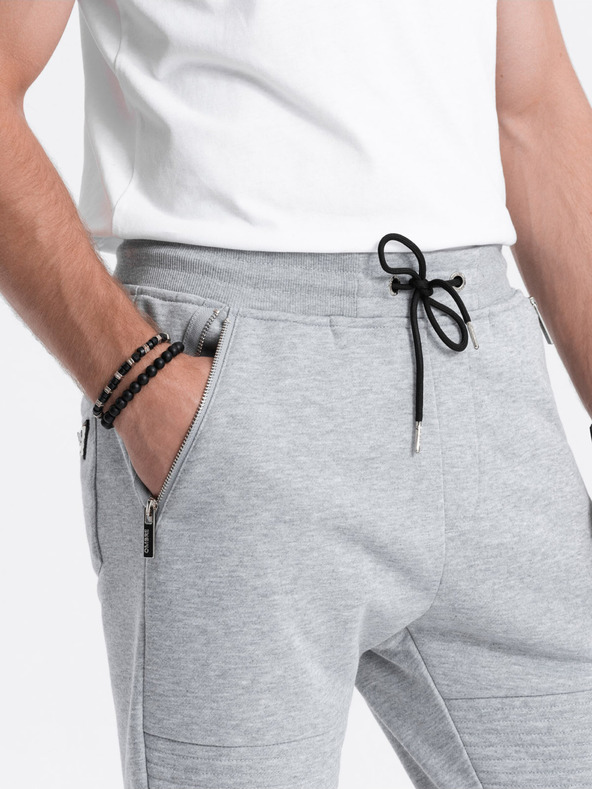 Ombre Clothing Svetlošedé pánske tepláky Ombre Clothing