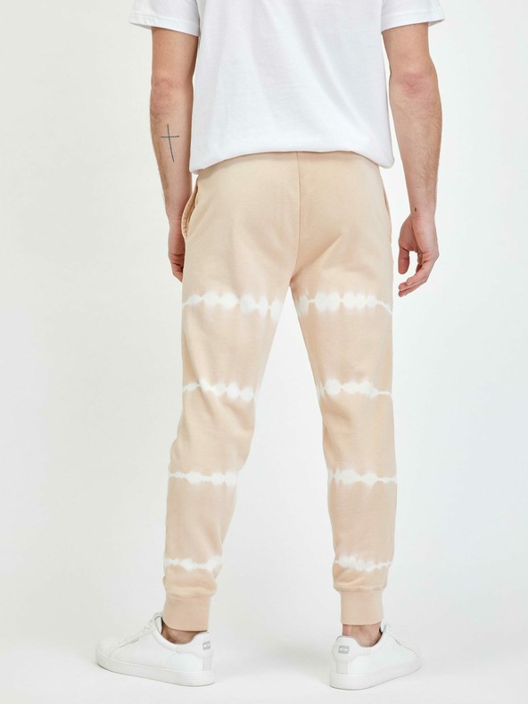 GAP Batikované tepláky logo GAP