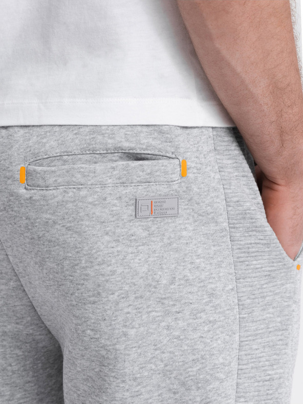 Ombre Clothing Svetlošedé pánske tepláky Ombre Clothing