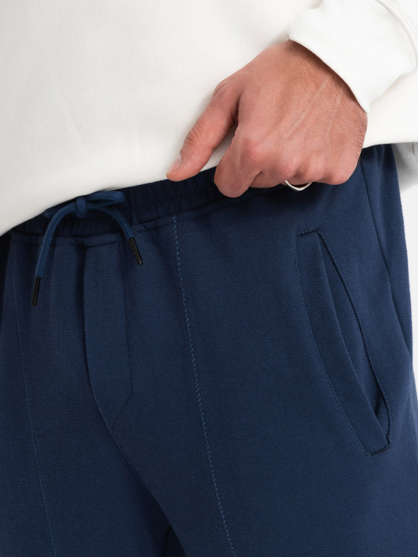 Ombre Clothing Tmavomodré pánske tepláky Ombre Clothing CARROT