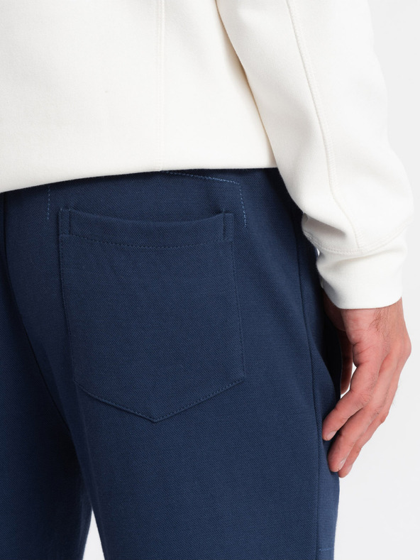 Ombre Clothing Tmavomodré pánske tepláky Ombre Clothing CARROT